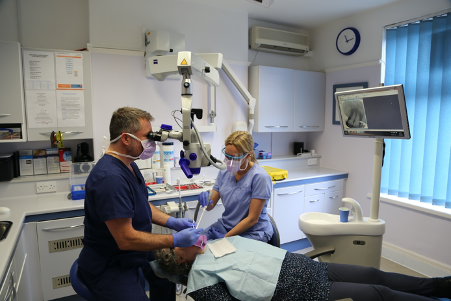 The team at the Permos Dental Practice in their reception area.