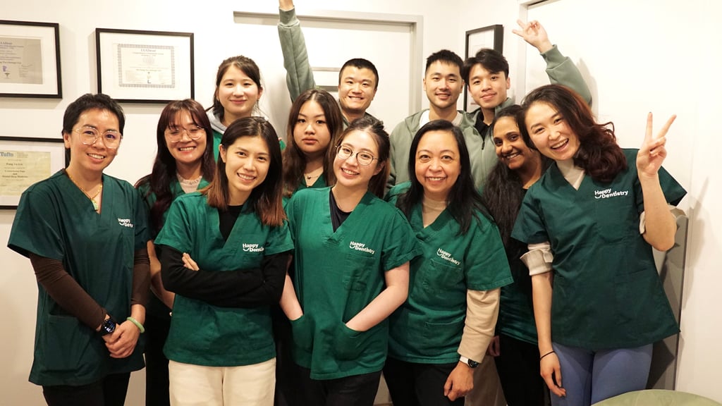 happy dentistry team photo